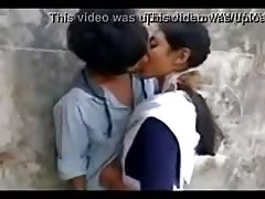 Indian school girl with hot kiss in outdoor