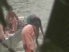 Indian women bathing by the river